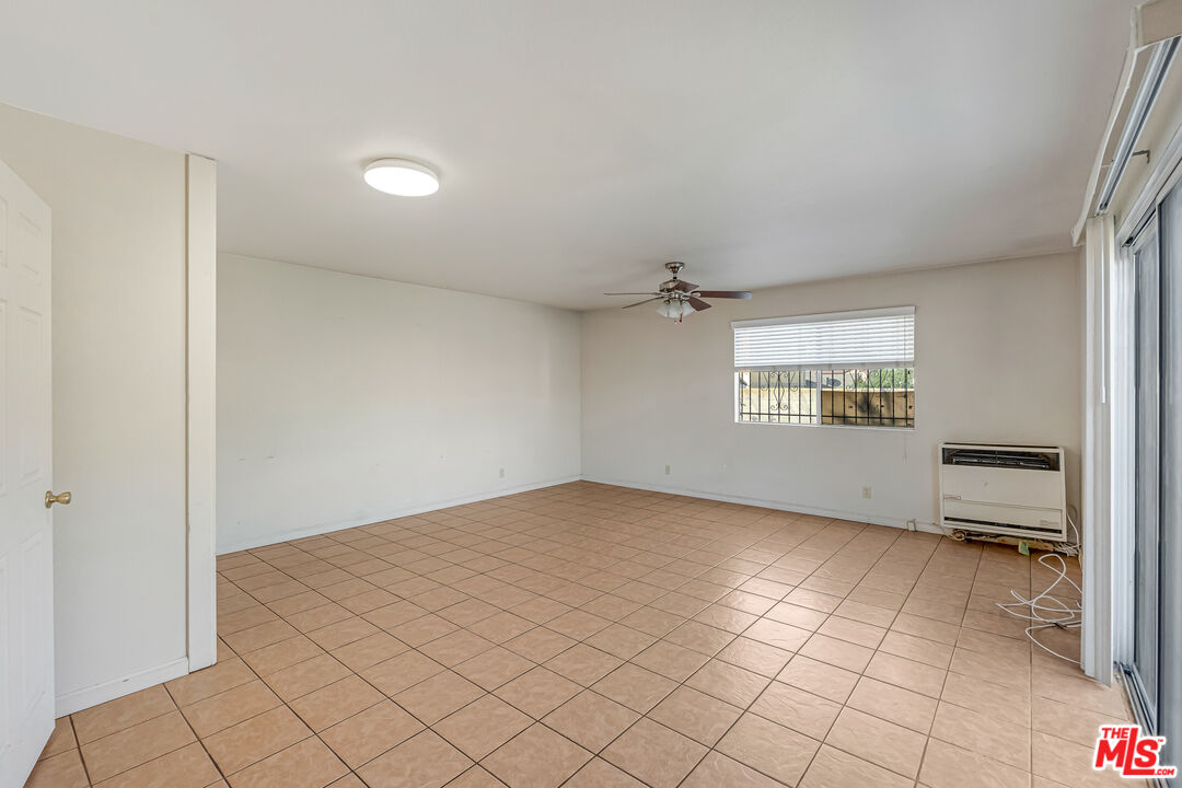 331 East 119th Street Los Angeles, CA 90061 - Photo 32 of 40 a view of an empty room and a window