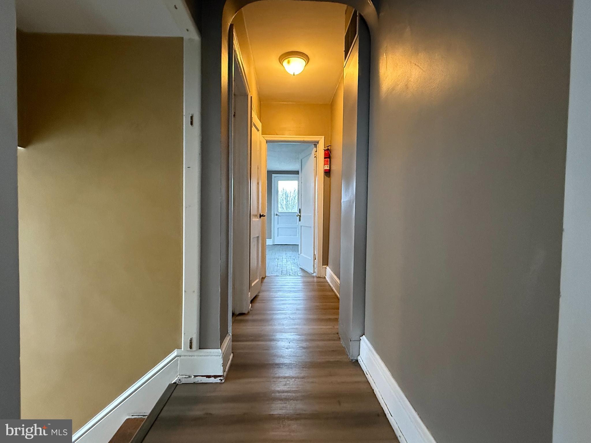 263 West Main Street Dallastown, PA 17313 - Photo 15 of 27 a view of a hallway with wooden floor