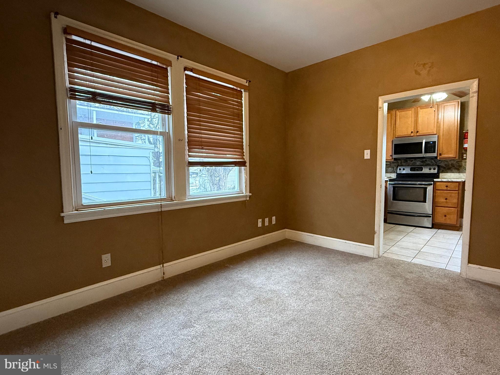 263 West Main Street Dallastown, PA 17313 - Photo 5 of 27 a view of an empty room with a window
