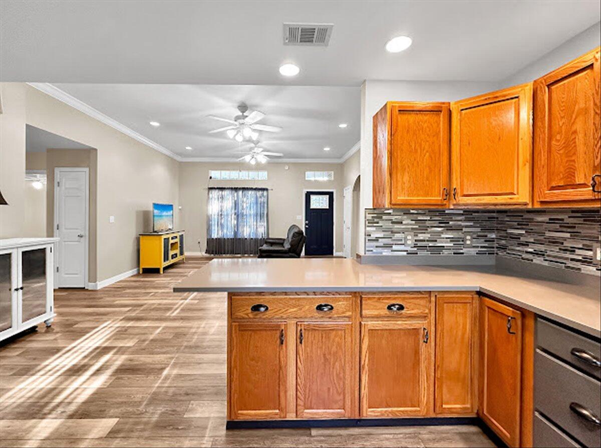 208 Hinote Road DeFuniak Springs, FL 32433 - Photo 19 of 49 a view of a kitchen with a sink and cabinets