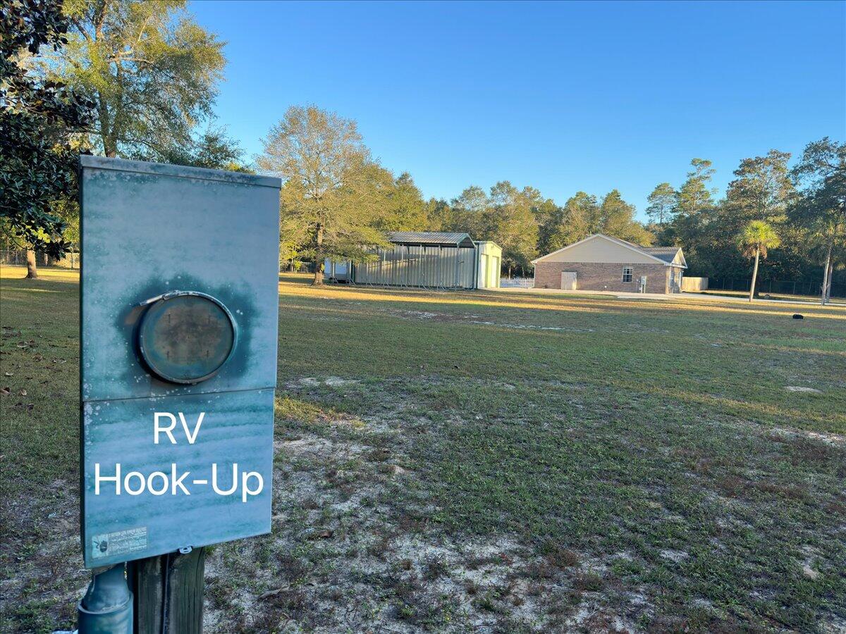 208 Hinote Road DeFuniak Springs, FL 32433 - Photo 40 of 49 a view of outdoor space with sign board
