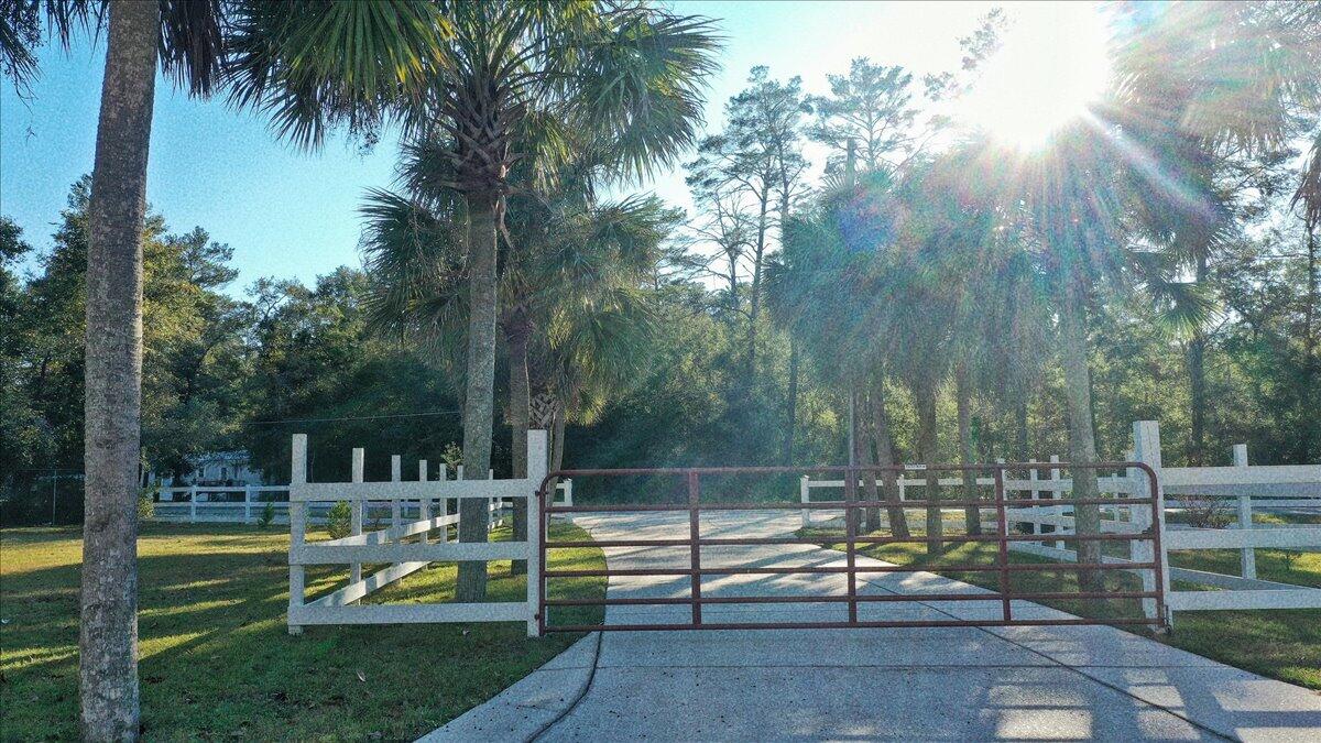 208 Hinote Road DeFuniak Springs, FL 32433 - Photo 49 of 49 a view of a house with swimming pool and sitting area