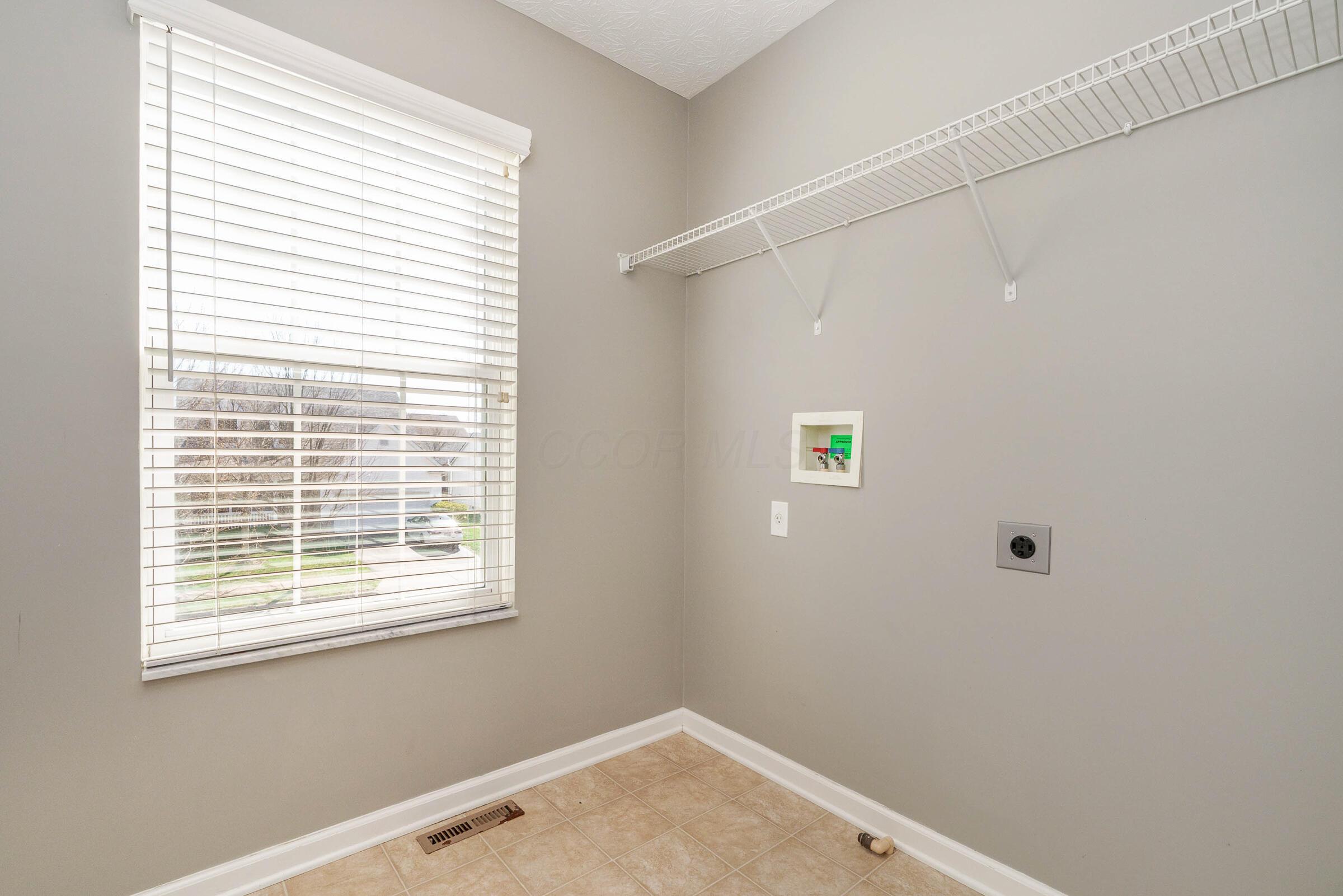 124 Stockard Loop Delaware, OH 43015 - Photo 16 of 54 Second Floor Laundry Room