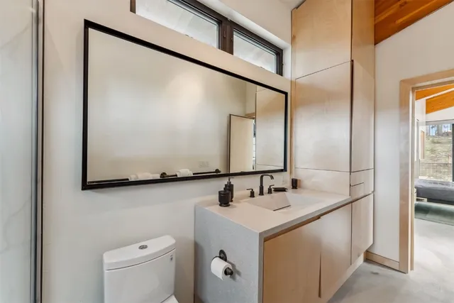 a view of staircase with wooden floor and entryway
