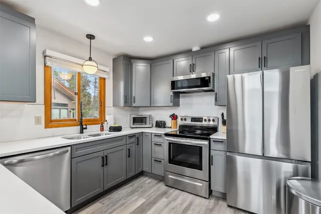 a balcony with furniture and wooden floor