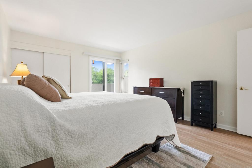 17607 Pomerado Road, Unit 101 San Diego, CA 92128 - Photo 21 of 39 a bedroom with a bed and a tv