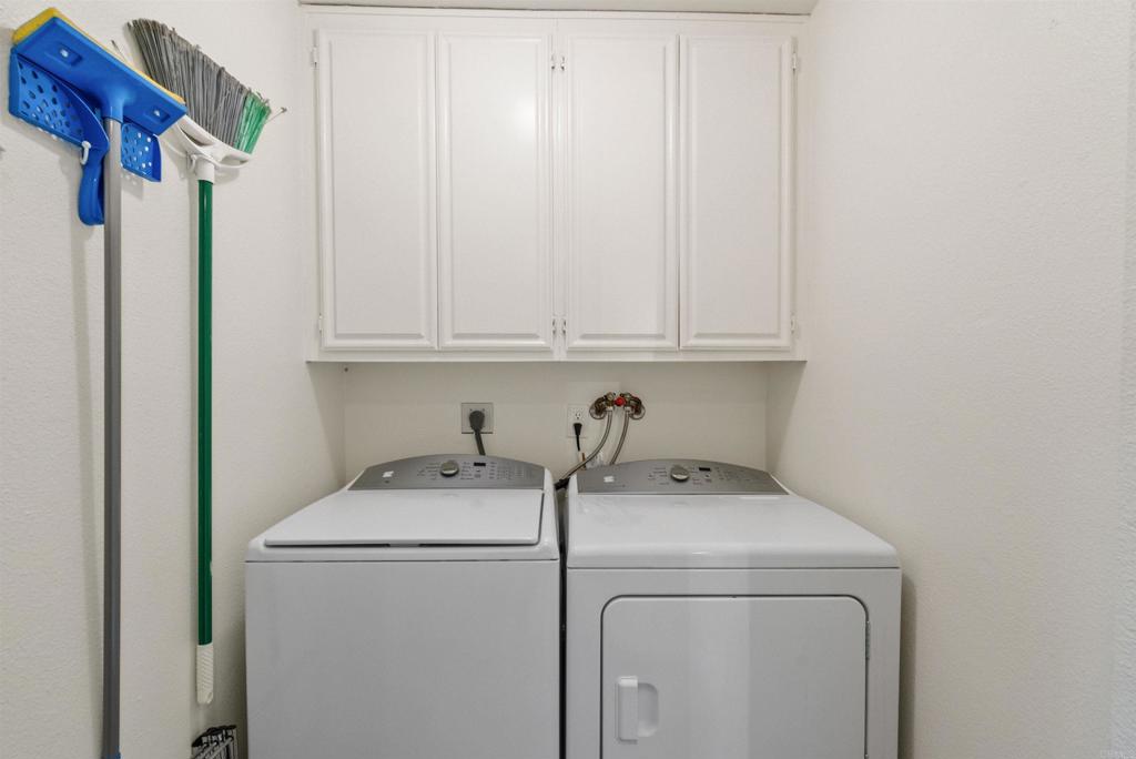 17607 Pomerado Road, Unit 101 San Diego, CA 92128 - Photo 33 of 39 a utility room with dryer and washer