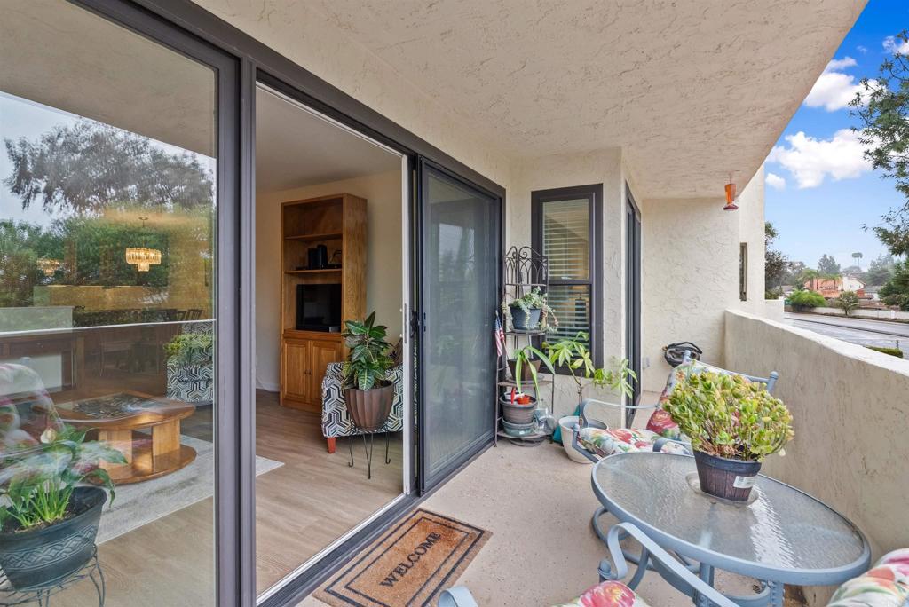 17607 Pomerado Road, Unit 101 San Diego, CA 92128 - Photo 38 of 39 a lobby with furniture and floor to ceiling window