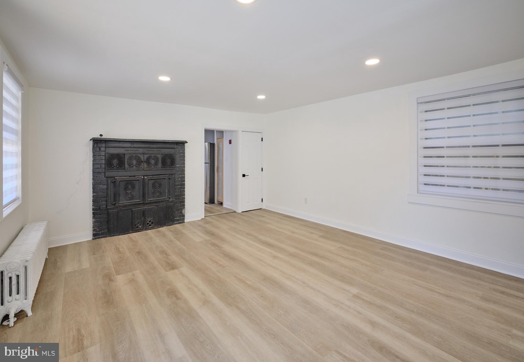 14 West Bridge Street, Unit A New Hope, PA 18938 - Photo 9 of 20 a view of empty room with cabinet and stairs