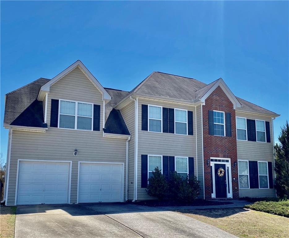 1102 Corkscrew Way Villa Rica, GA 30180 - Photo 1 of 1 a house view with a garden space