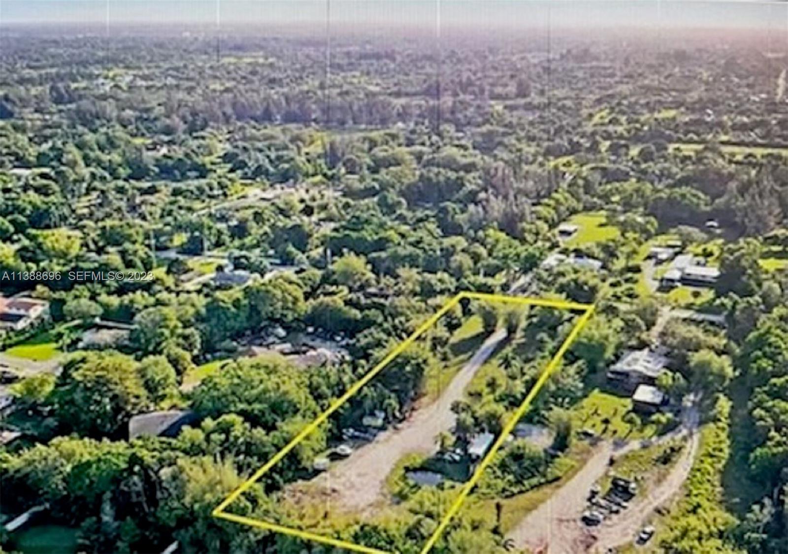 6453 Southwest 185th Way Southwest Ranches, FL 33332 - Photo 2 of 8 an aerial view of residential houses with outdoor space and trees