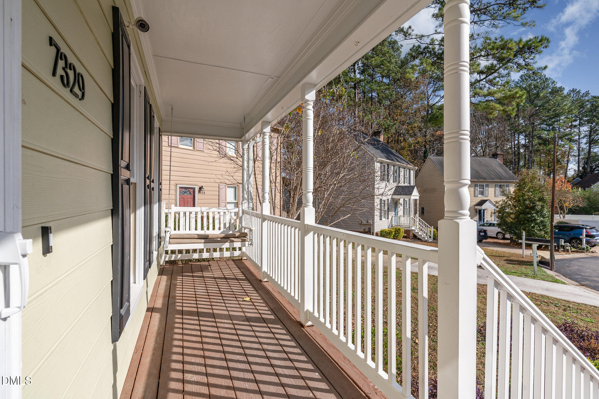 7329 Bassett Hall Court Raleigh, NC 27616 - Photo 5 of 35 a view of a balcony with wooden floor