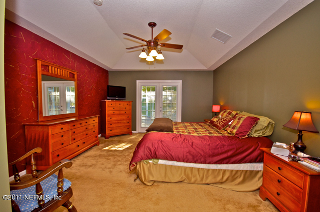 3276 Gay Road Orange Park, FL 32065 - Photo 11 of 21 a bedroom with a bed and window