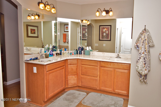 3276 Gay Road Orange Park, FL 32065 - Photo 14 of 21 a bathroom with a sink vanity and mirror