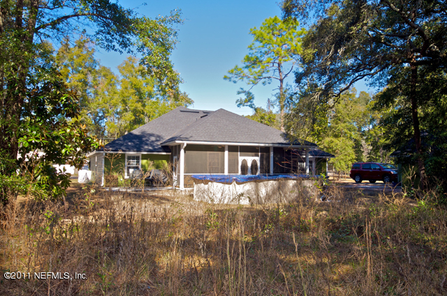 3276 Gay Road Orange Park, FL 32065 - Photo 21 of 21 a front view of a house with yard and green space
