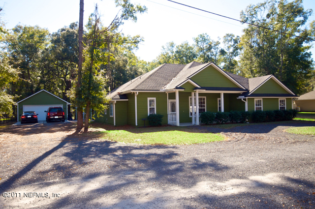 3276 Gay Road Orange Park, FL 32065 - Photo 3 of 21 a front view of a house with a yard