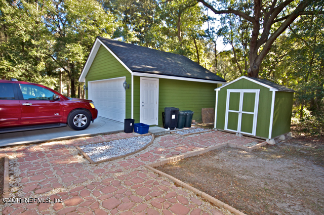 3276 Gay Road Orange Park, FL 32065 - Photo 6 of 21 a front view of a house with a yard