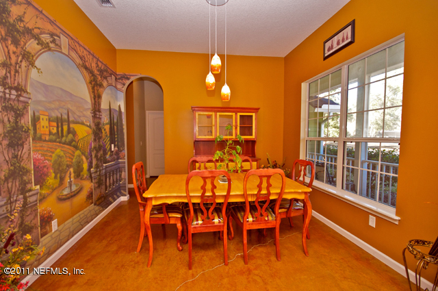3276 Gay Road Orange Park, FL 32065 - Photo 7 of 21 a view of a dining room with furniture window and outside view