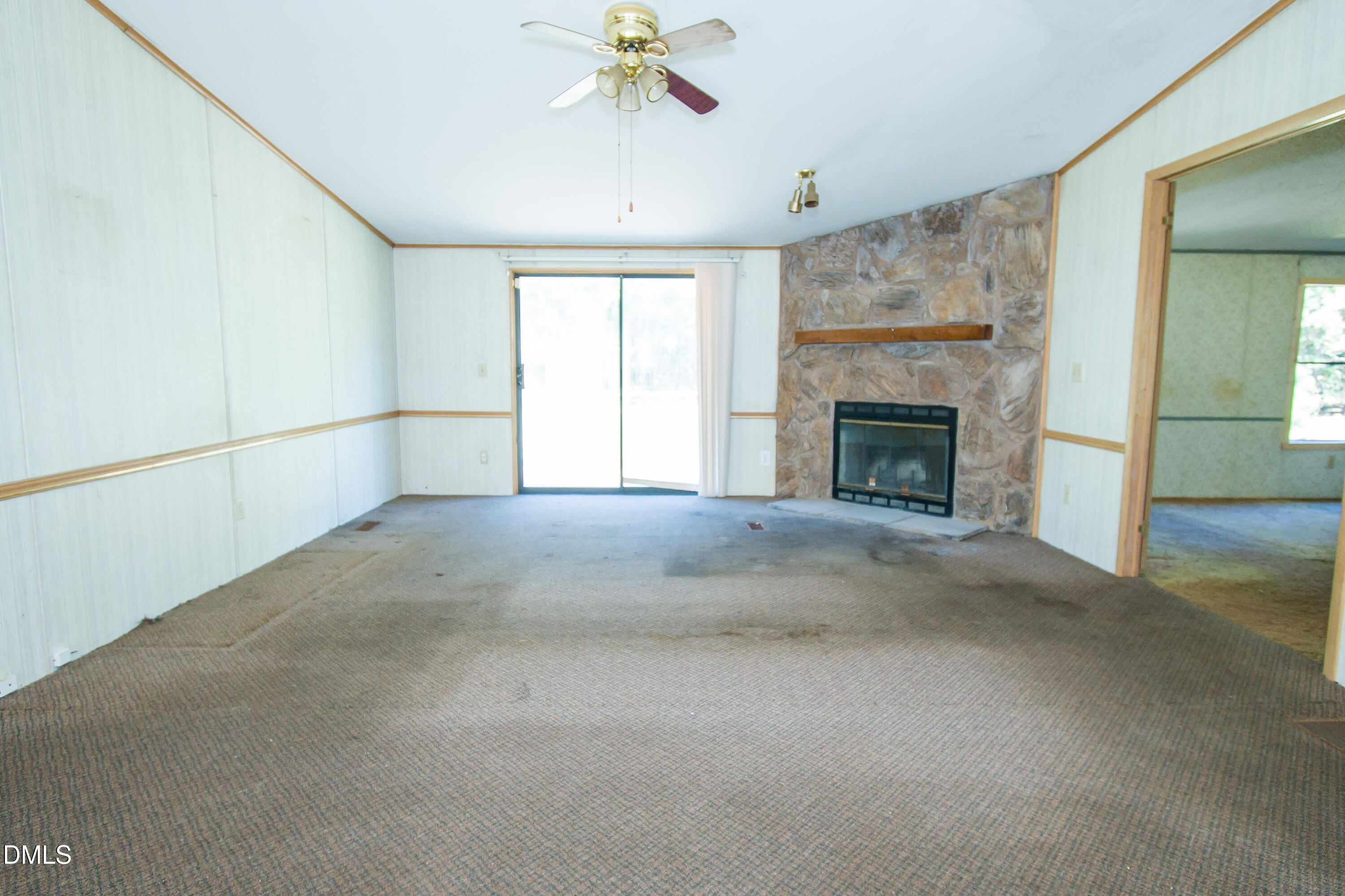 2909 Dureamer Road Wendell, NC 27591 - Photo 3 of 17 a view of empty room with a fireplace