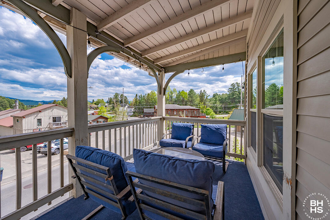 6143 Sentinel Road, Unit # 7 Lake Placid, NY 12946 - Photo 13 of 18 Downhill7Condo_CoveredPorch