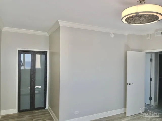 a view of an empty room with a window