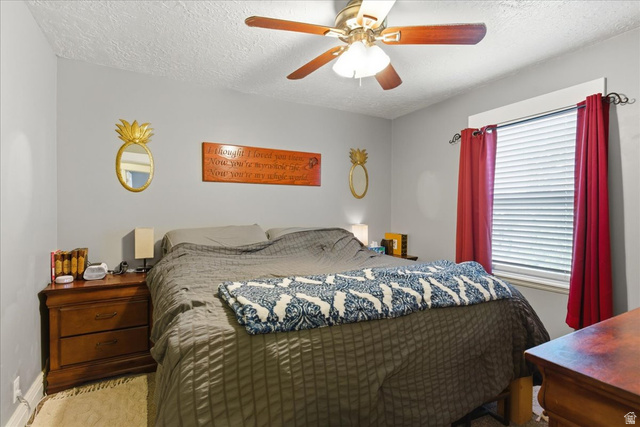 170 North 200 West Springville, UT 84663 - Photo 5 of 13 Bedroom featuring a ceiling fan with integrated lighting, a window with blinds, and light gray wall paint