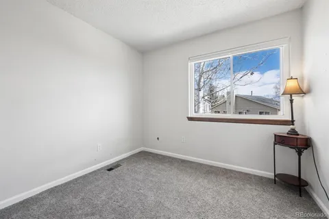 a view of wall with painting on the wall