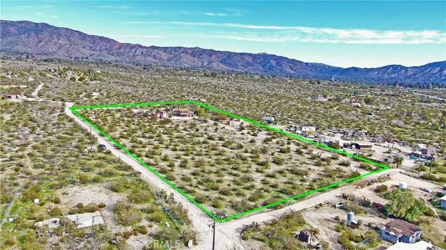 a view of a city with a mountain