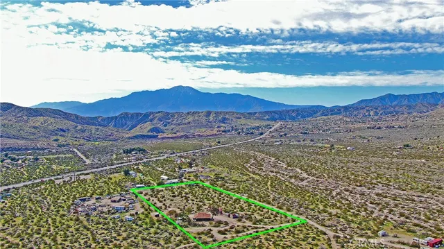 a view of a lake with a building in the background
