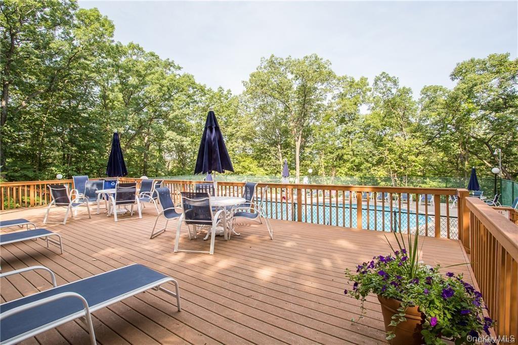 150 Overlook Avenue, Unit 2K Peekskill, NY 10566 - Photo 16 of 26 a view of a chair and tables