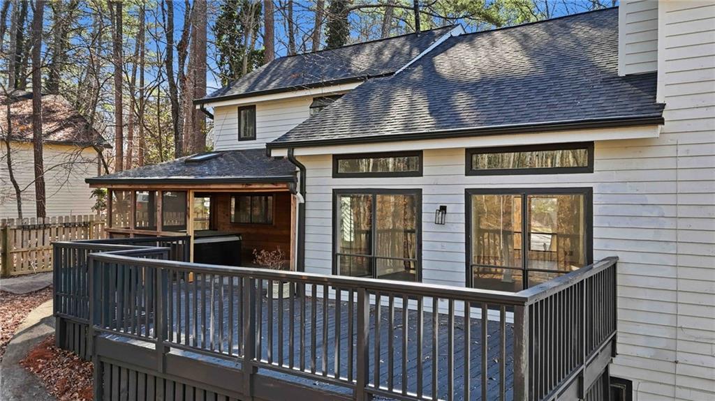 8975 Martin Road Roswell, GA 30076 - Photo 24 of 32 a view of brick house with large windows