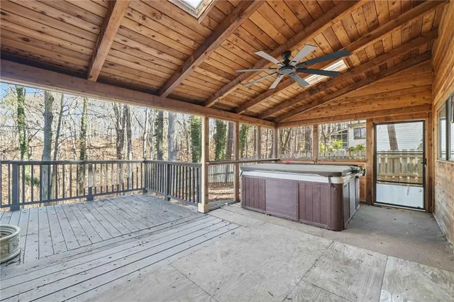 a view of an empty room with a balcony