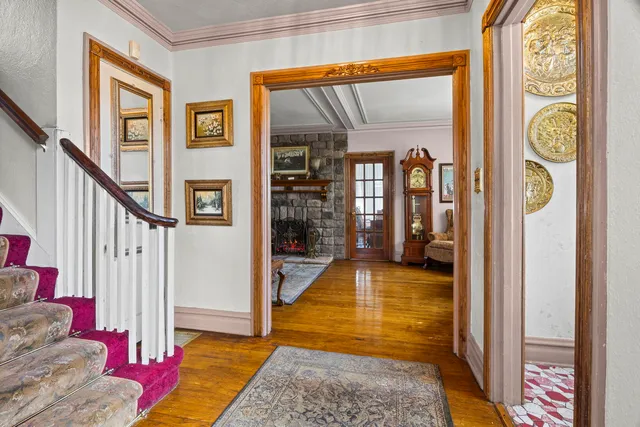 a living room with furniture and flat screen tv
