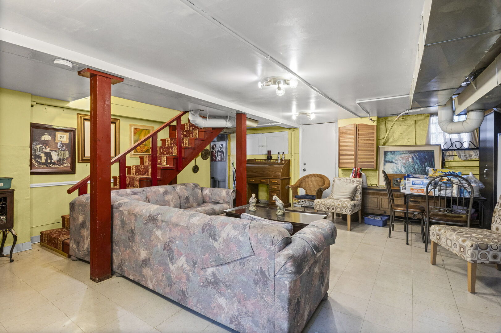 15 East 155th Street Harvey, IL 60426 - Photo 22 of 25 a living room with lots of furniture and a large window