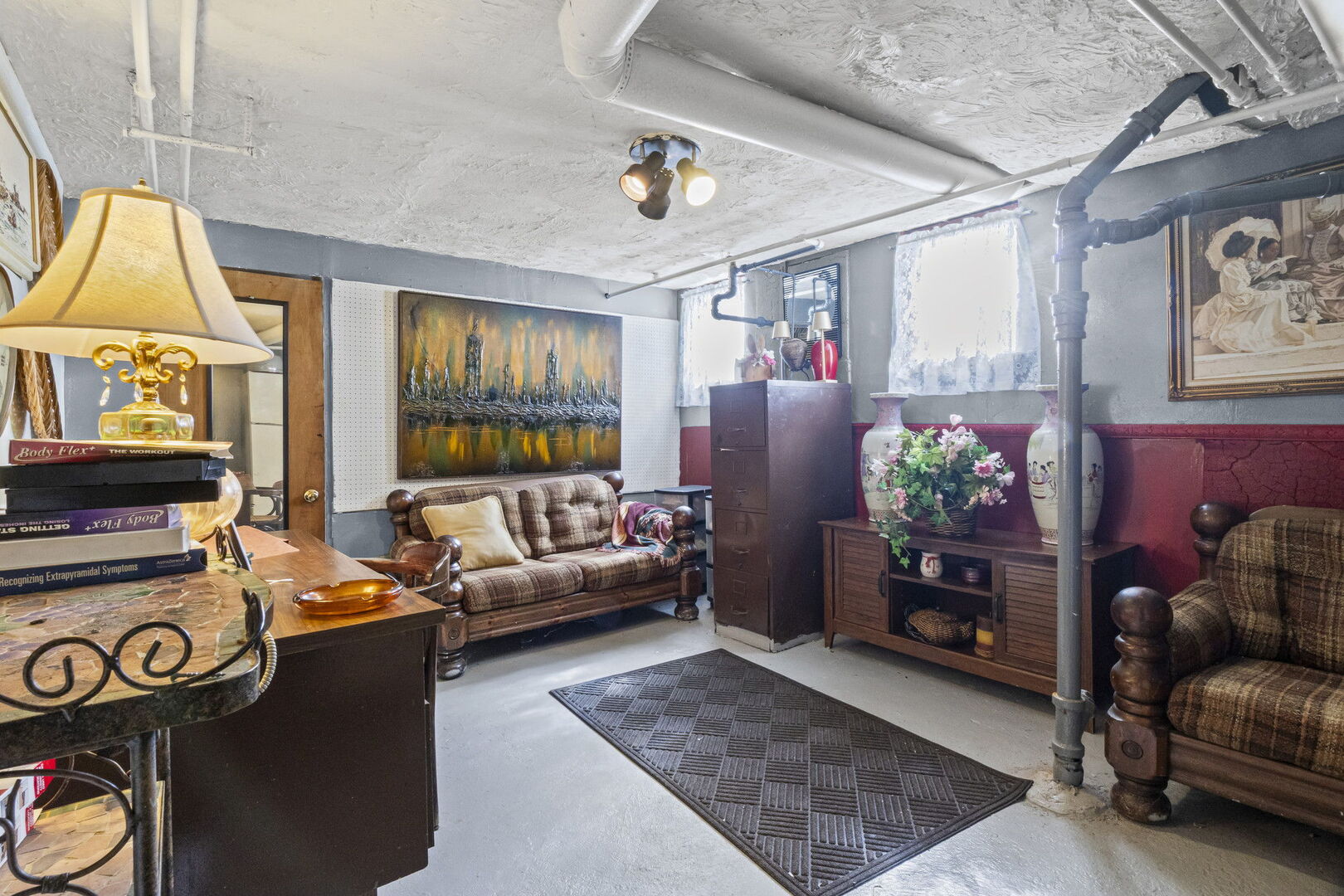 15 East 155th Street Harvey, IL 60426 - Photo 24 of 25 a living room with furniture and a potted plant