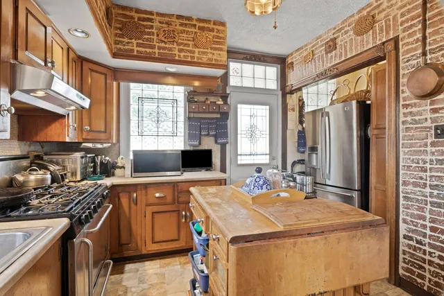 a room with a large bed and a large window