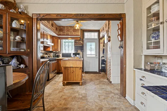 a view of a kitchen with furniture and a kitchen