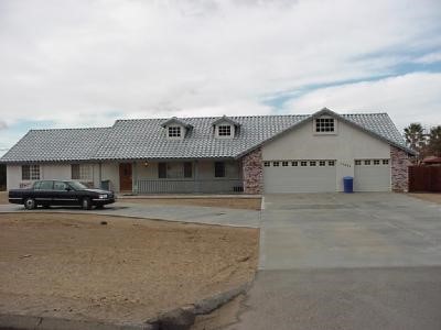 20040 Modoc Road Apple Valley, CA 92308 - Photo 1 of 1 a view of a house with a terrace