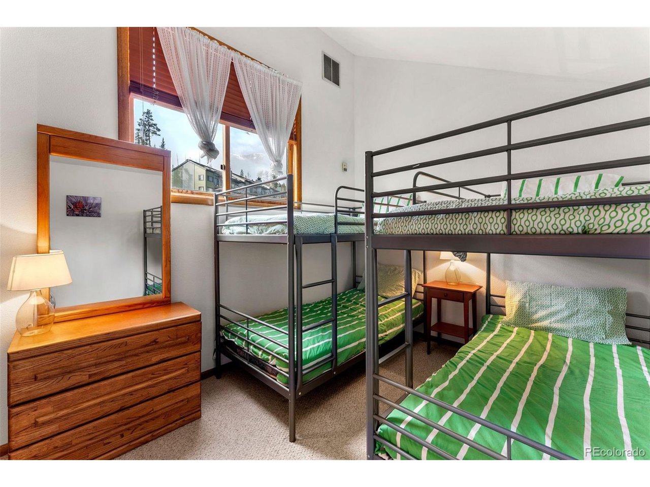 10500 Ryan Gulch Road, Unit J Silverthorne, CO 80498 - Photo 18 of 22 Bedroom 2