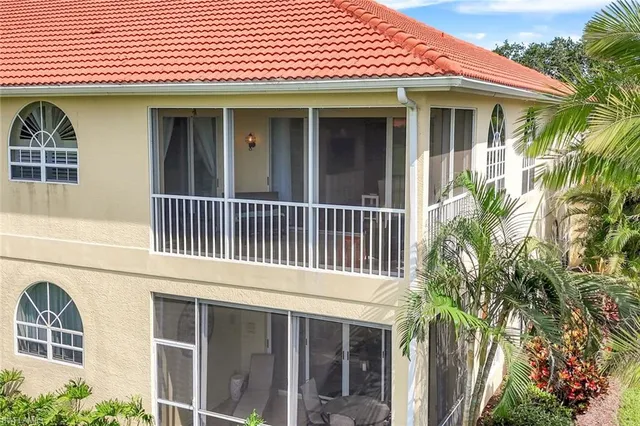 aerial view of a house with a yard