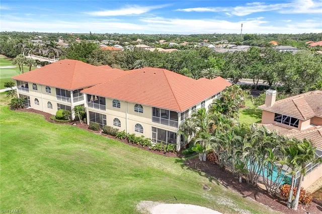 a view of a playground with basketball court
