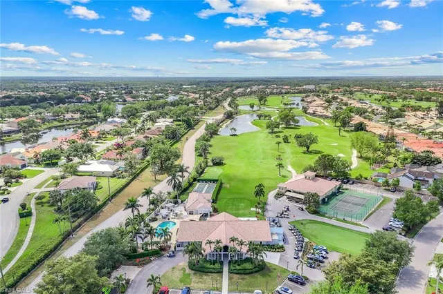 a view of a house with a big yard