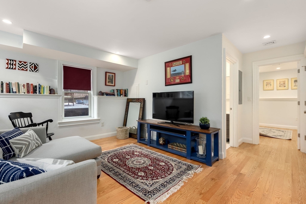 2 Tabor Place Brookline, MA 02445 - Photo 20 of 30 a living room with furniture and a flat screen tv