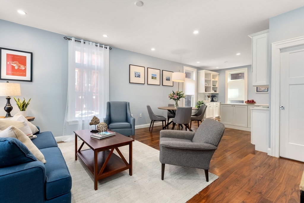 2 Tabor Place Brookline, MA 02445 - Photo 2 of 30 a living room with furniture and a wooden floor