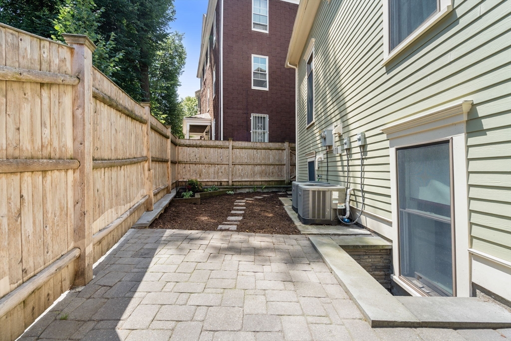 2 Tabor Place Brookline, MA 02445 - Photo 29 of 30 a view of a back yard of the house
