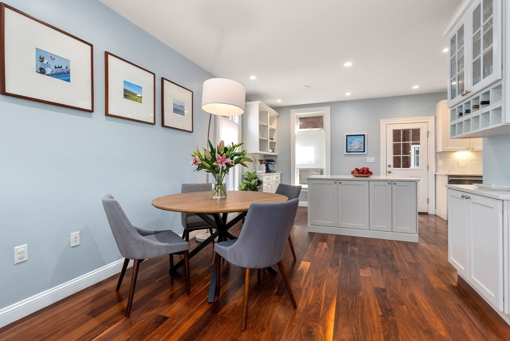 2 Tabor Place Brookline, MA 02445 - Photo 5 of 30 a view of a dining room with furniture and wooden floor