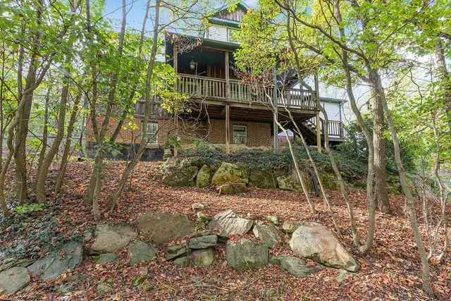 a backyard of a house with lots of green space
