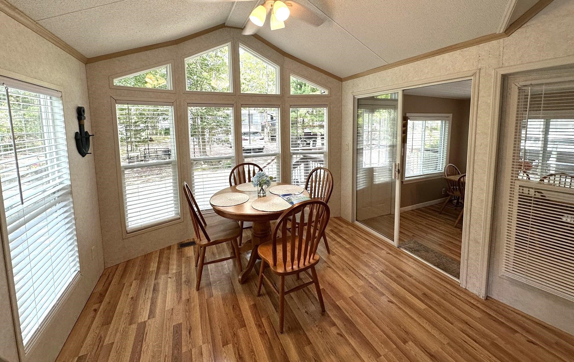 3066 North Rte 9 Ocean View, NJ 08230 - Photo 13 of 49 a view of a dining room with furniture window and wooden floor