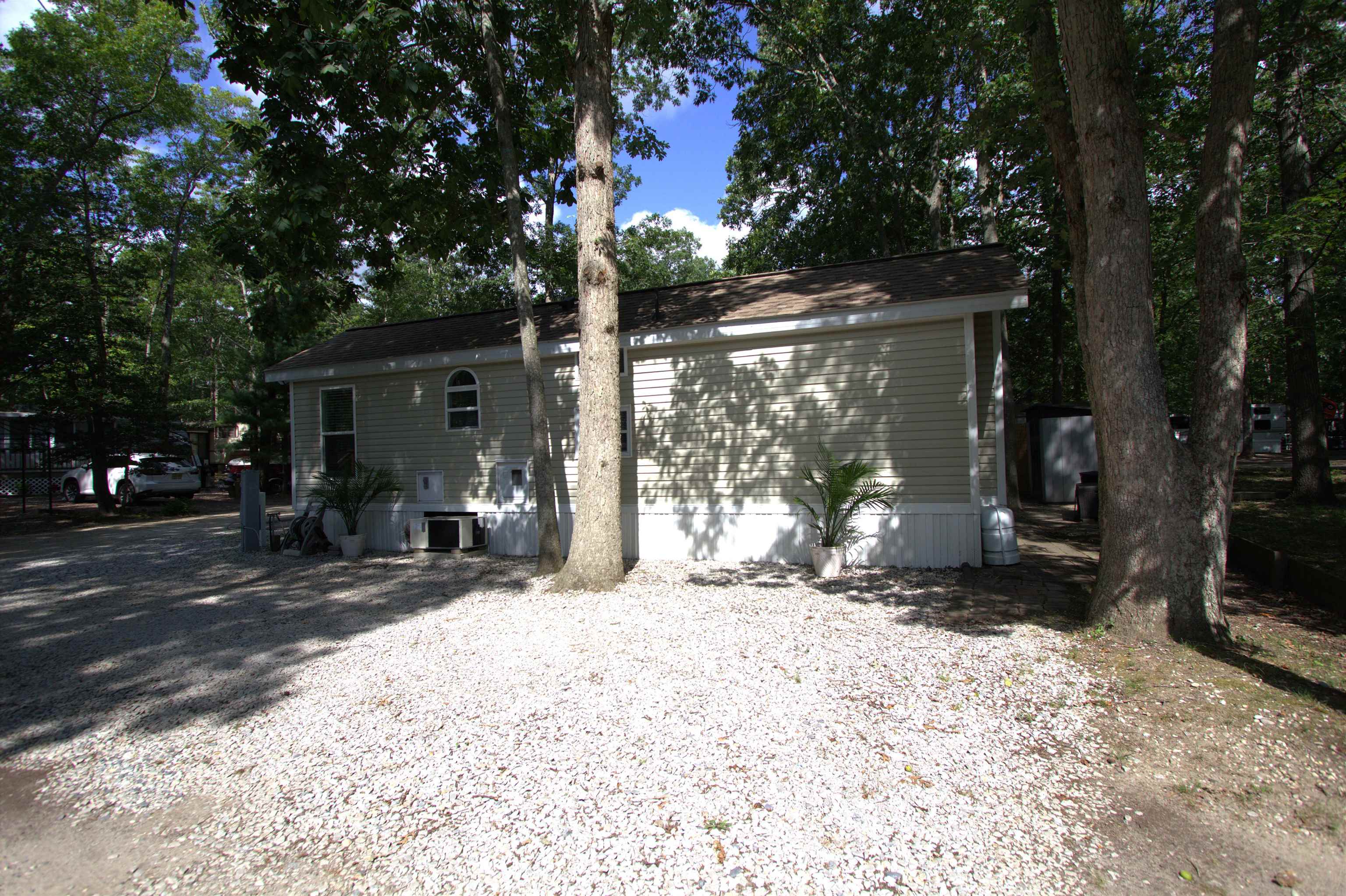 3066 North Rte 9 Ocean View, NJ 08230 - Photo 33 of 49 a view of a house with a tree in front of it