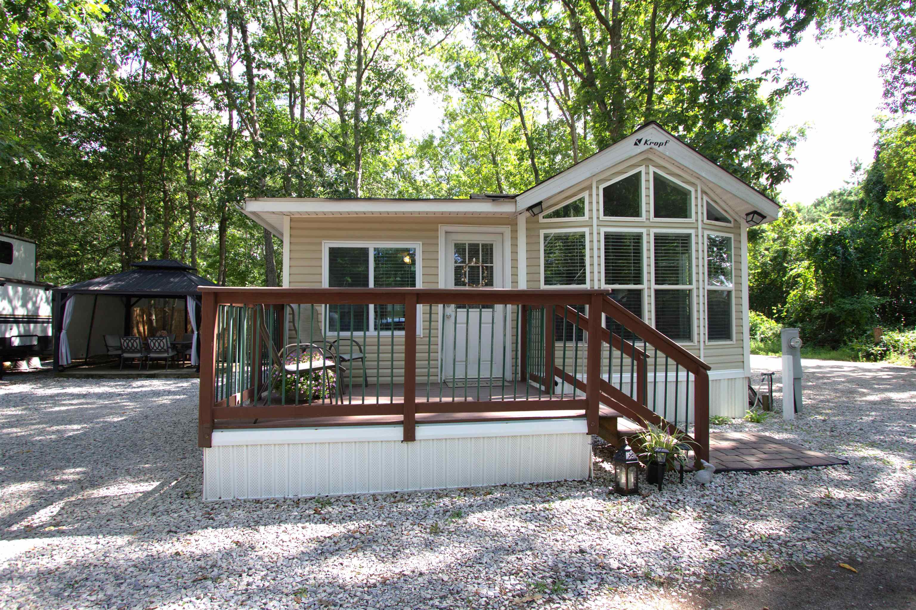 3066 North Rte 9 Ocean View, NJ 08230 - Photo 36 of 49 a view of a house with a yard deck and a garden